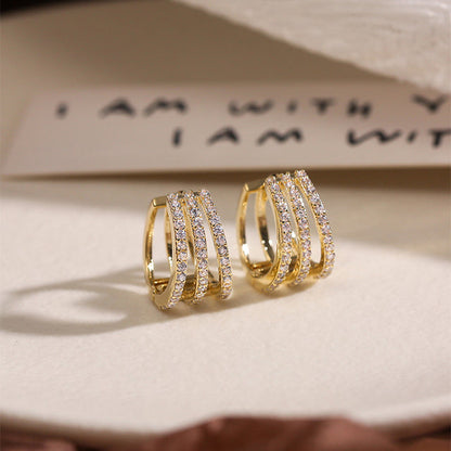 Goldene Ohrringe mit Zirkonia, luxuriös, elegant, für Frauen, Schmuck, Geschenkideen.