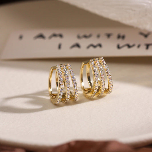 Goldene Ohrringe mit Zirkonia, luxuriös, elegant, für Frauen, Schmuck, Geschenkideen.