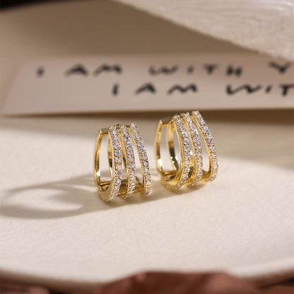Goldene Ohrringe mit Zirkonia, luxuriös, elegant, für Frauen, Schmuck, Geschenkideen.