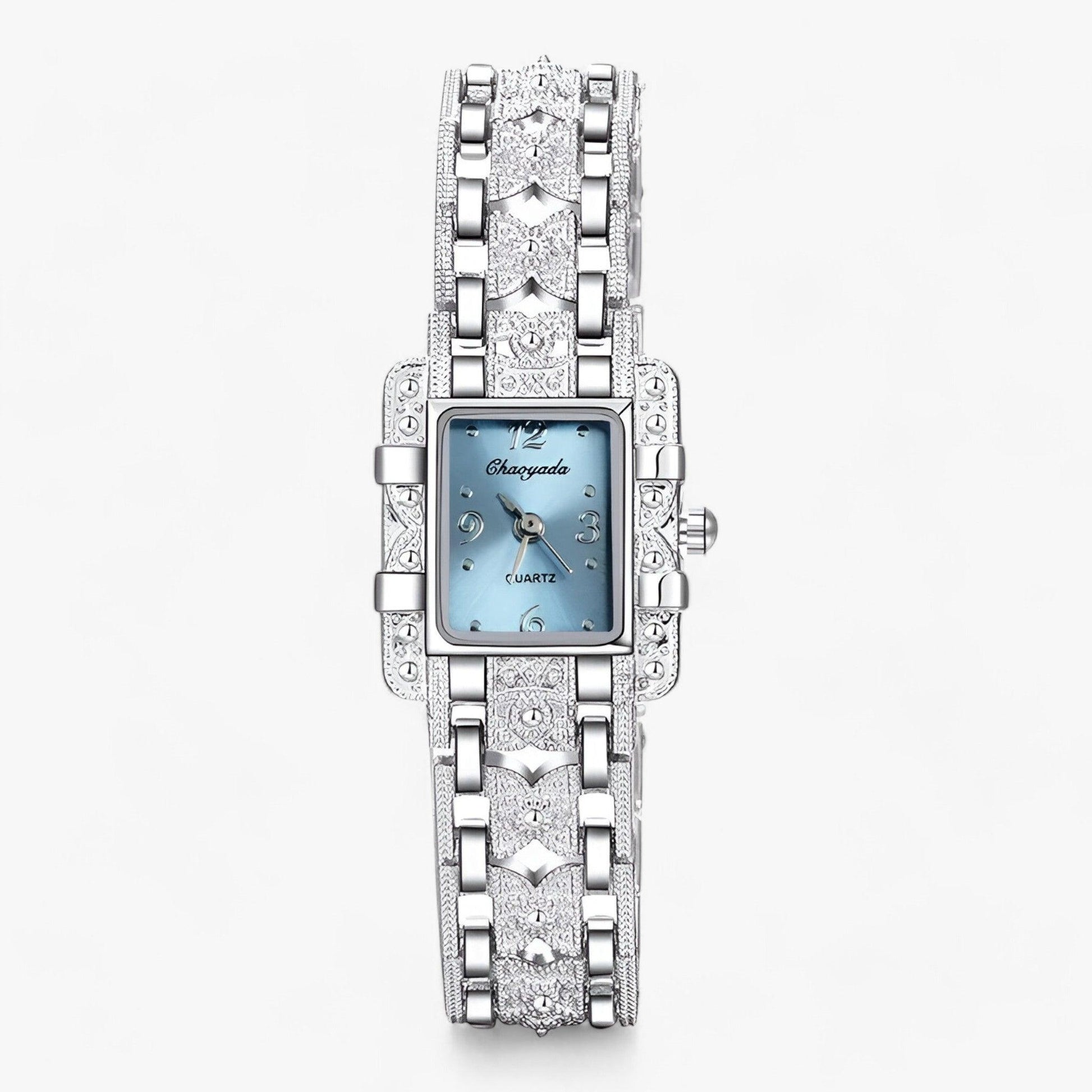 Luxus Damenarmbanduhr, silber, rechteckiges Zifferblatt, blaue Anzeige, Strassverzierung.