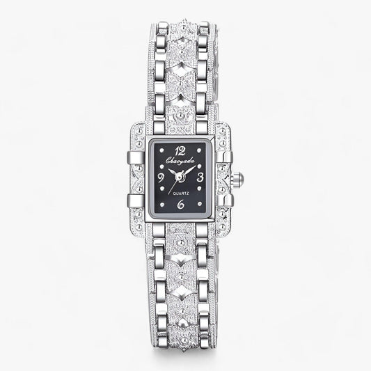 Silberne Damenarmbanduhr mit rechteckigem Zifferblatt, Quarzwerk, elegantes Design.