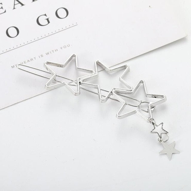 Silberne Haarspange mit Sternen, modisches Accessoire, elegantes Design, Geschenkidee.