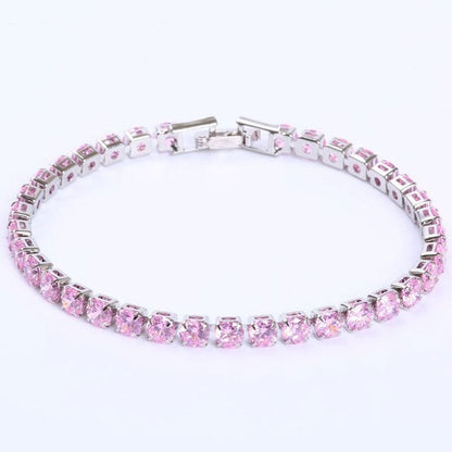 Silbernes Armband mit rosa Kristallen, elegantes Schmuckstück, funkelndes Design.