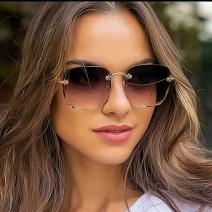 Trendy kantløs solbrille med UV400-beskyttelse i vintage-look – Clea