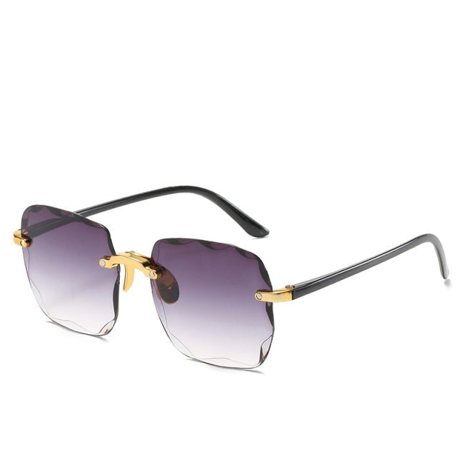 Trendy kantløs solbrille med UV400-beskyttelse i vintage-look – Clea