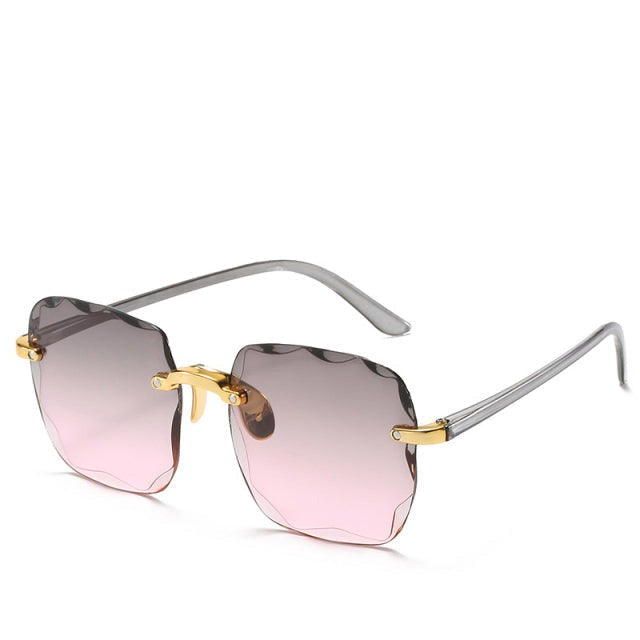Trendy kantløs solbrille med UV400-beskyttelse i vintage-look – Clea