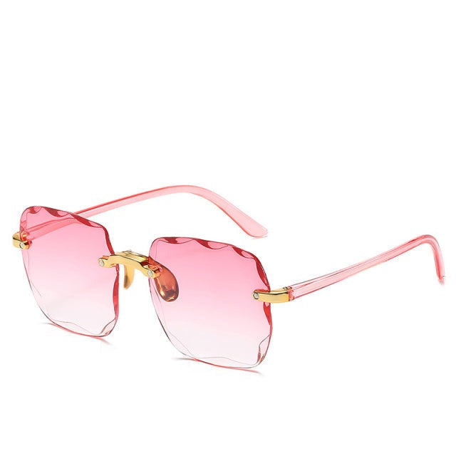 Trendy kantløs solbrille med UV400-beskyttelse i vintage-look – Clea