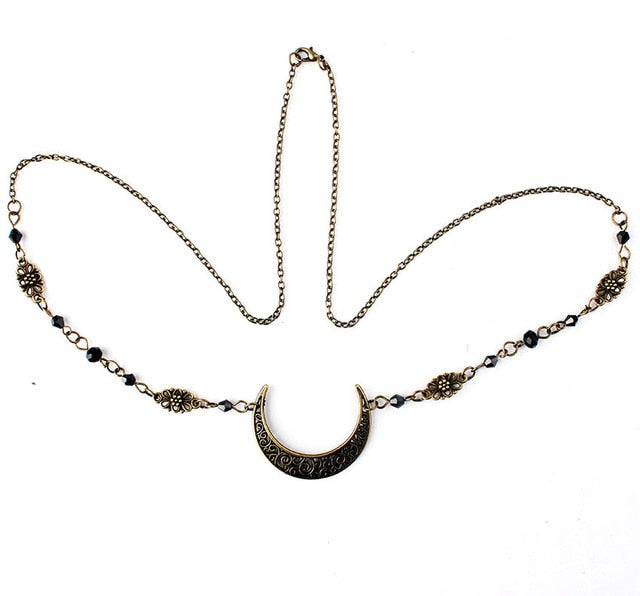 Antike goldene Halskette mit Halbmond-Anhänger, filigranes Design, Damen-Schmuck.