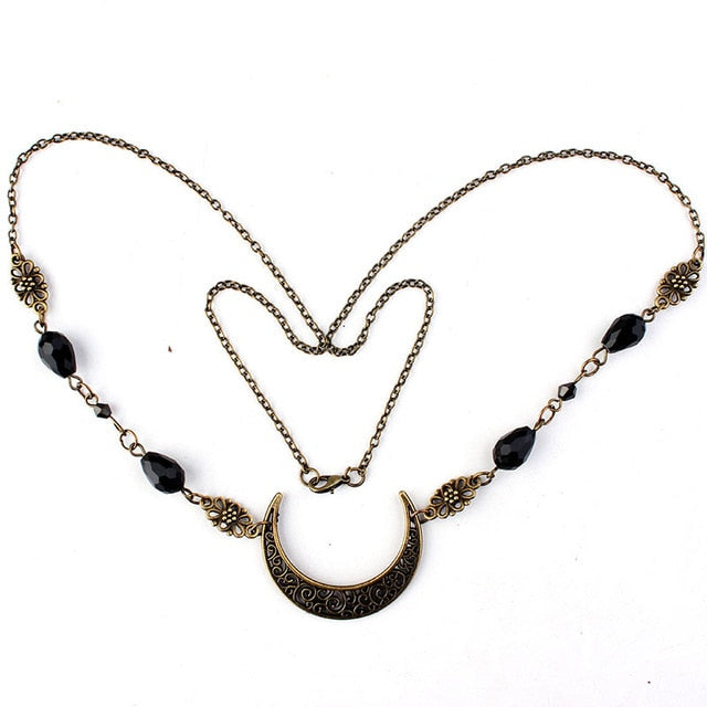 Antike Halskette mit schwarzem Mondanhänger, filigranem Design, Vintage-Stil, Damen-Schmuck.