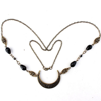 Antike Halskette mit schwarzem Mondanhänger, filigranem Design, Vintage-Stil, Damen-Schmuck.